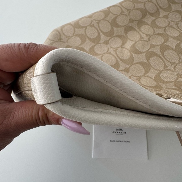 Coach Signature Light Khaki Zip Tote with three inside pockets 17”W x 11”H x 6”D - Picture 10 of 17